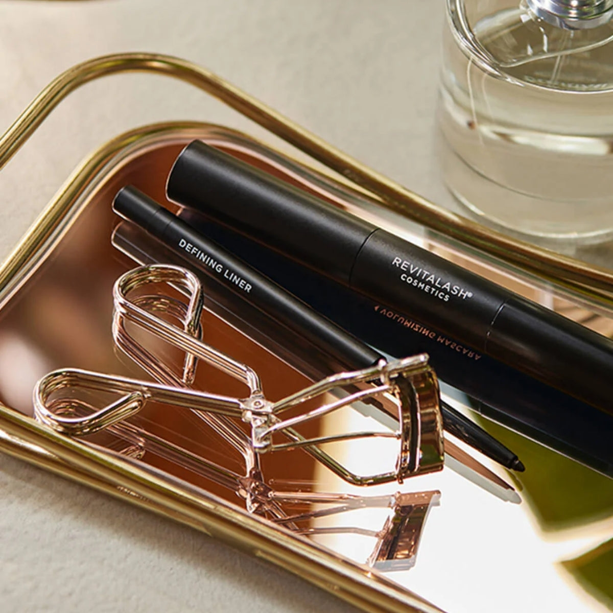 Signature Eyelash Curler · Rizador de pestañas